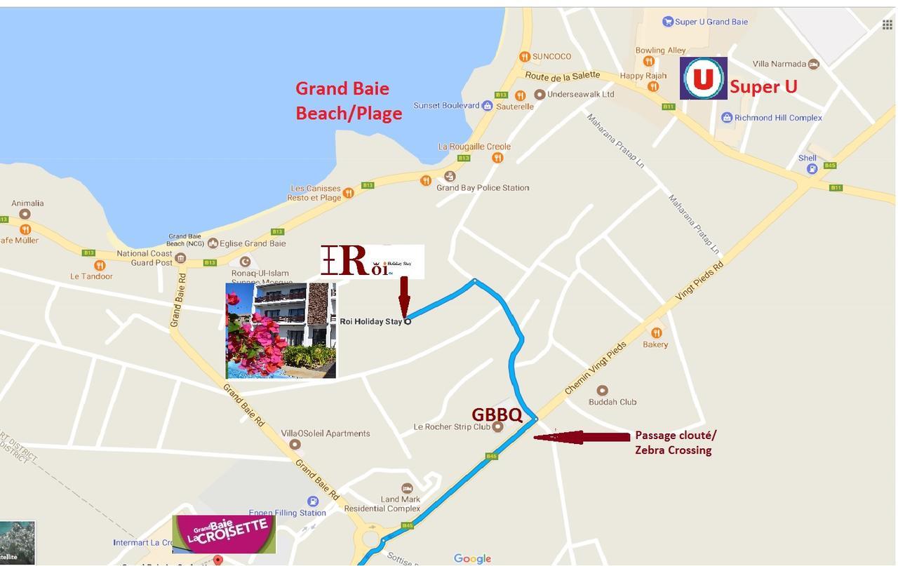 Roi Holiday Stay กรองด์เบย์ ภายนอก รูปภาพ