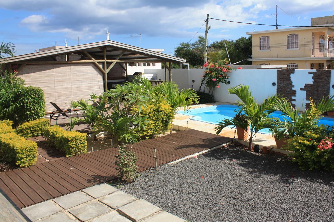 Roi Holiday Stay กรองด์เบย์ ภายนอก รูปภาพ