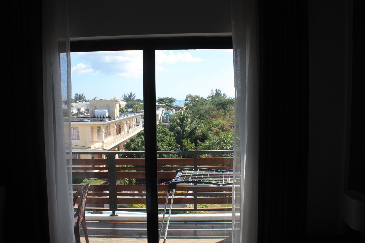 Roi Holiday Stay กรองด์เบย์ ภายนอก รูปภาพ